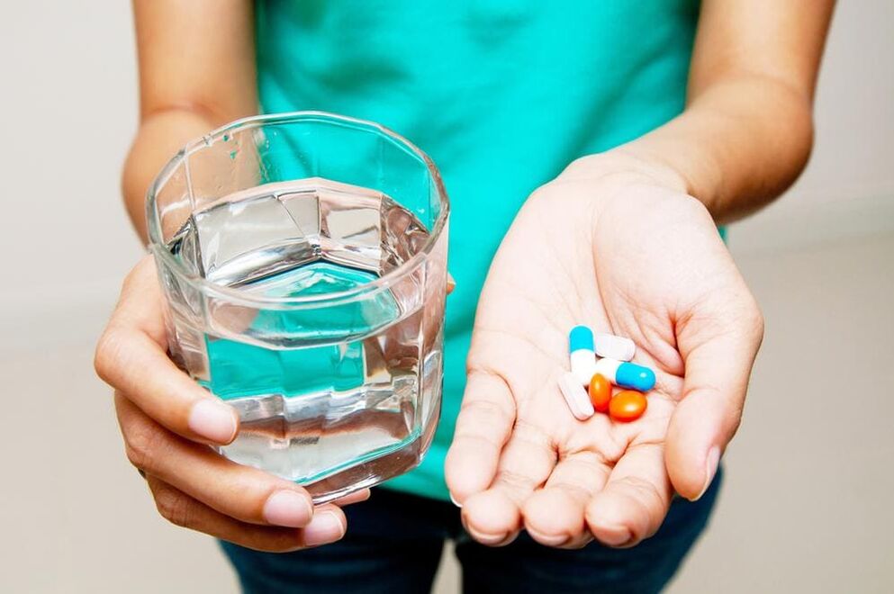 A girl takes medication to get rid of papilloma